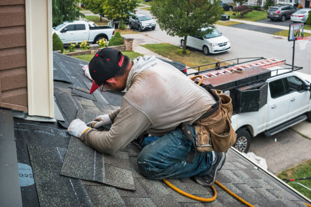 Professional Roofing technician working in Medway, ME